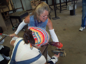 Photo of Jayne teaching a student.